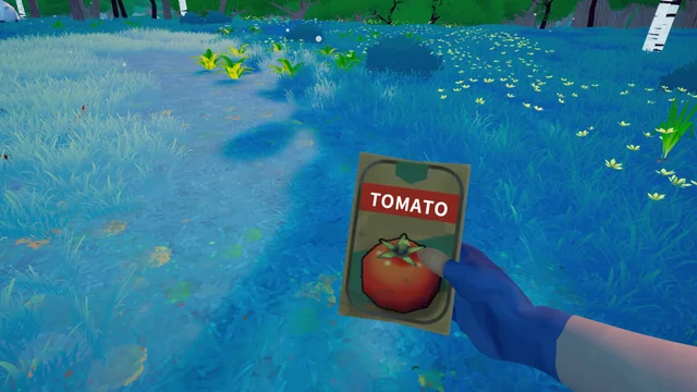 Holding a packet of tomato seeds beside growing plants
